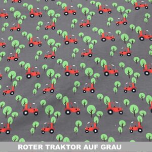 Roter Traktor auf grau