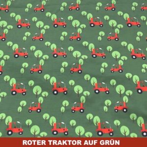 Roter Traktor auf grün